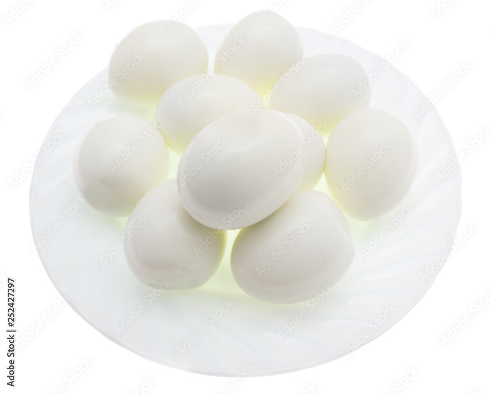 Peeled boiled eggs in a plate on a white background Peeled boiled eggs in a plate on a white background