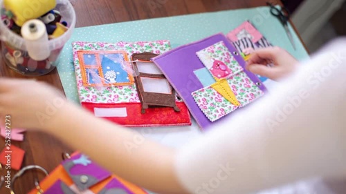 Wallpaper Mural woman crafting colorful felt book Torontodigital.ca