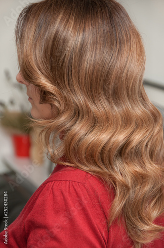 Woman with wave hairstyle in beauty salon