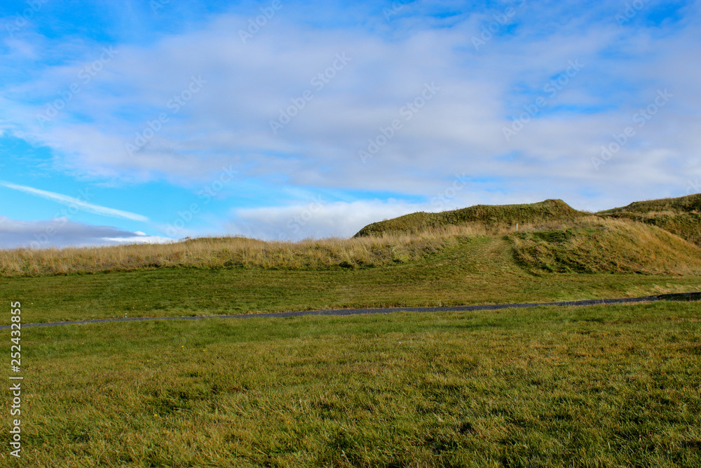 hiking in grassy fields of Iceland hiking in grassy fields of Iceland