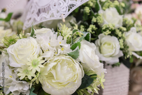 Wedding decor and accessory. Beautiful bouquet of white roses for the bride