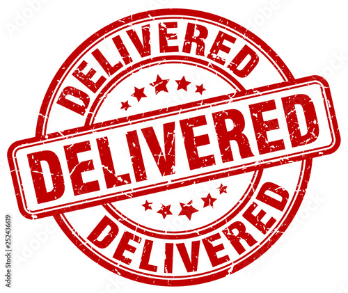 delivered red grunge stamp