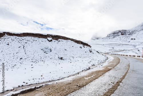 Road trip view on the way across the northern Nyenchen Tanglha Mountains Range from lake Namtso to Damxung County, Lhasa, Tibet, China. photo