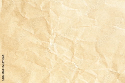 Old brown crumpled paper background texture