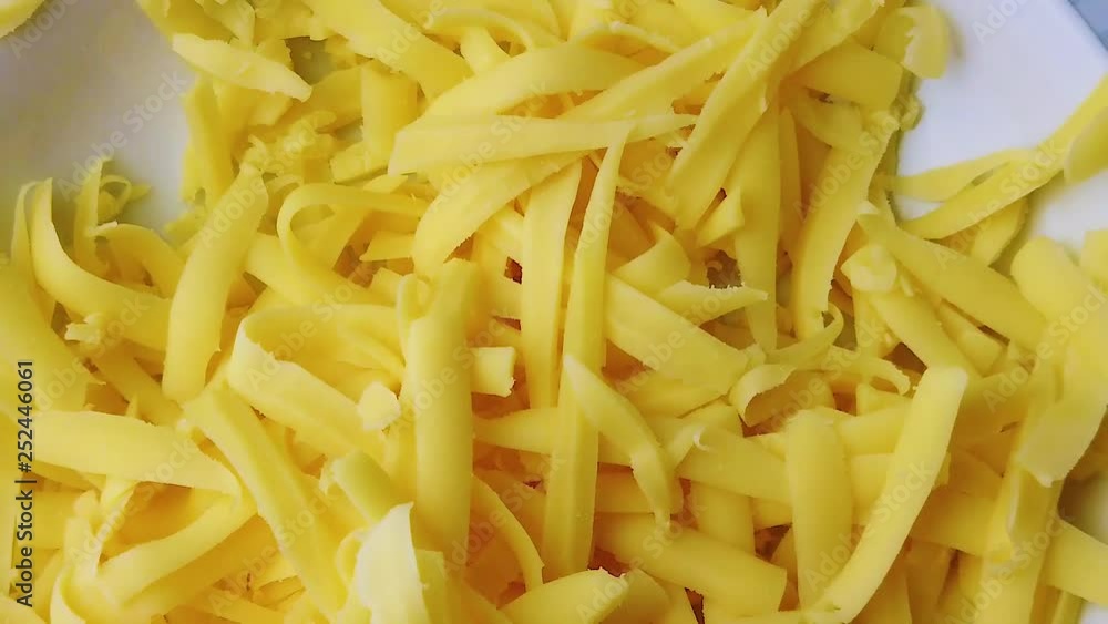Slow motion HD video of grated cheese in real. Slow motion HD video of grated cheese in real.