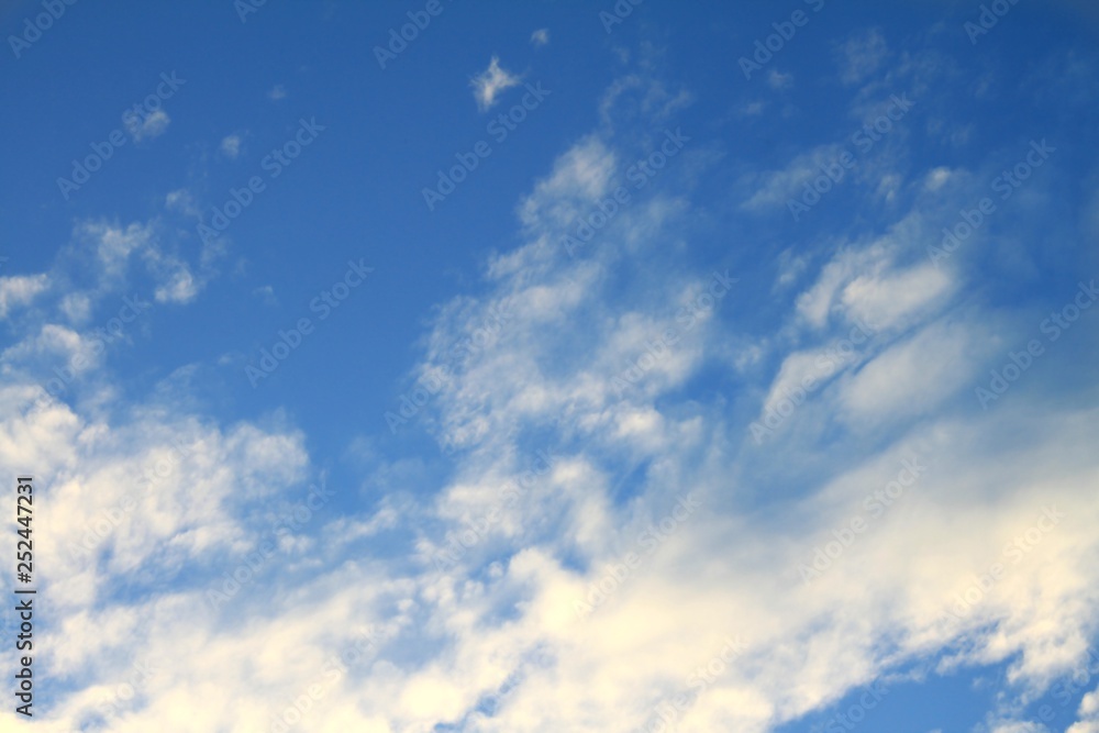 Beautiful bright delicate white clouds on a background of blue summer sky Beautiful bright delicate white clouds on a background of blue summer sky
