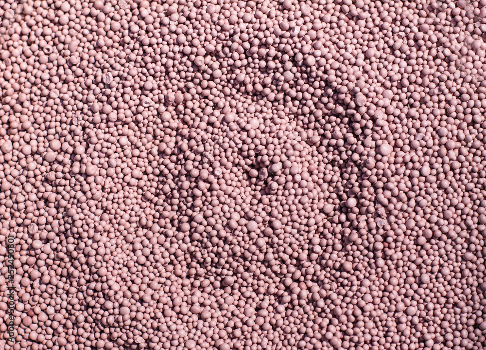 Fertilizer for the garden with minerals. Nitrates for rapid plant growth. Beautiful texture. Stock background, photo Fertilizer for the garden with minerals. Nitrates for rapid plant growth. Beautiful texture. Stock background, photo