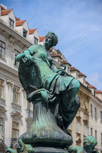 VIENNA, AUSTRIA - AUGUST 11, 2017: Donnerbrunnen fountain in Vienna, Austria. Baroque fountain located on Neuer Markt square. The fountain was built in 1737