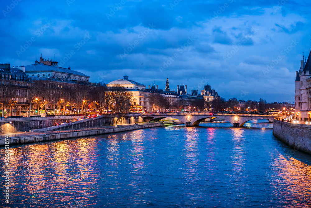 Night view of the Seine river, Paris - France