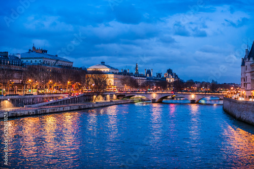 Night view of the Seine river, Paris - France