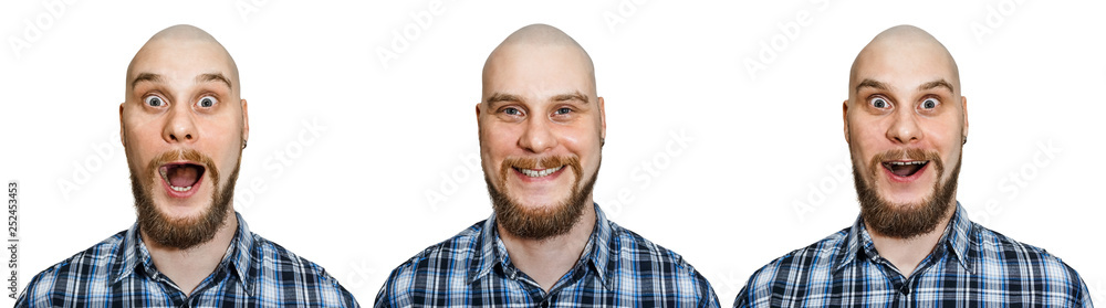 Fototapeta premium A bald guy with a beard depicts different emotions: happiness, joy, surprise on an isolated white background