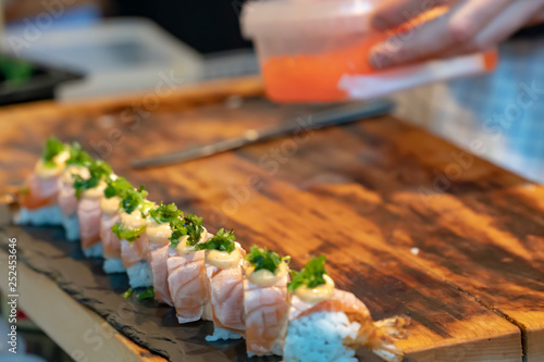 preparing salmon sushi