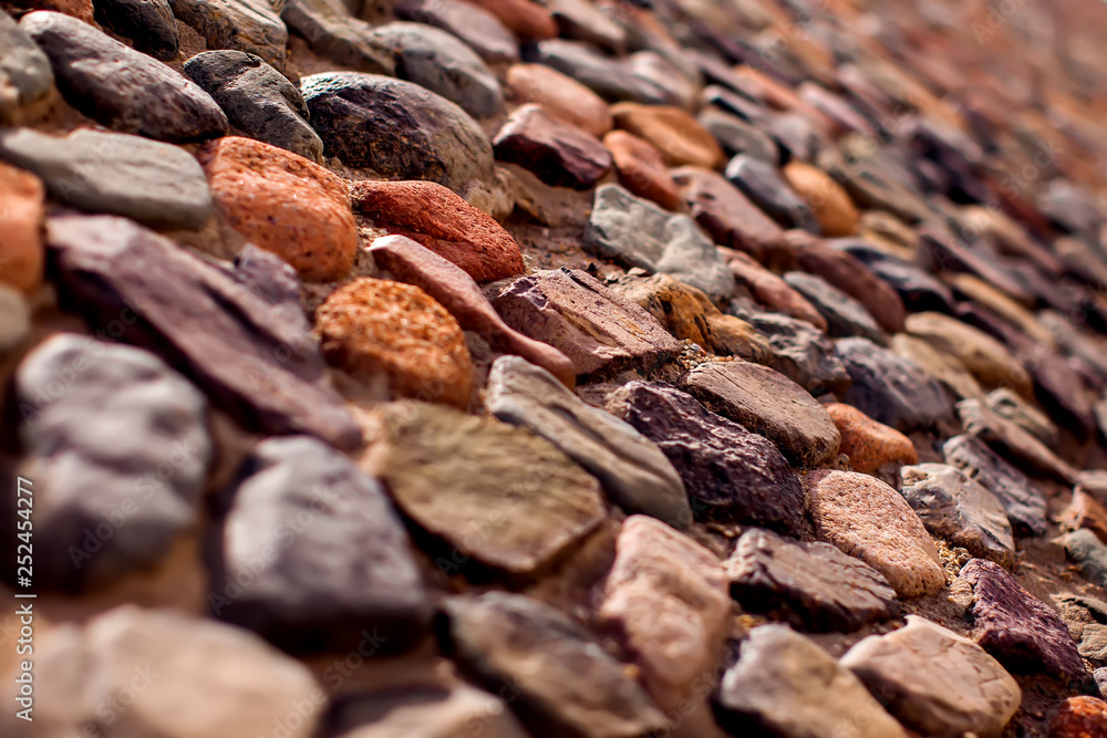 Pebble wall are made of stones of different sizes. Pebble wall are made of stones of different sizes.
