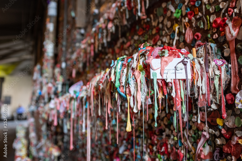 A close up of the Market Theatre Gum Wall in downtown Seattle The wall is a local landmark.