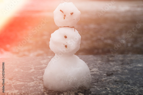 snowman in a park with retro look