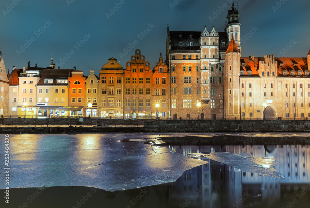 Mariacka Gate and other sights of Gdansk on the bank of the Motlawa, evening view