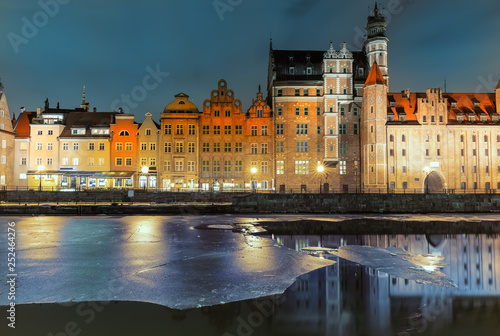 Mariacka Gate and other sights of Gdansk on the bank of the Motlawa, evening view