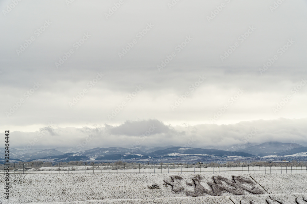 Winter landscape with clouds