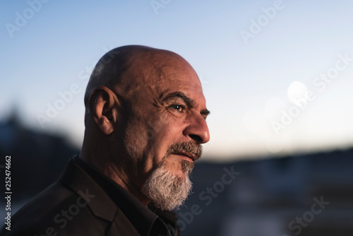 Photography Elegant images of a mature man of 60 years during the night in the outskirts of