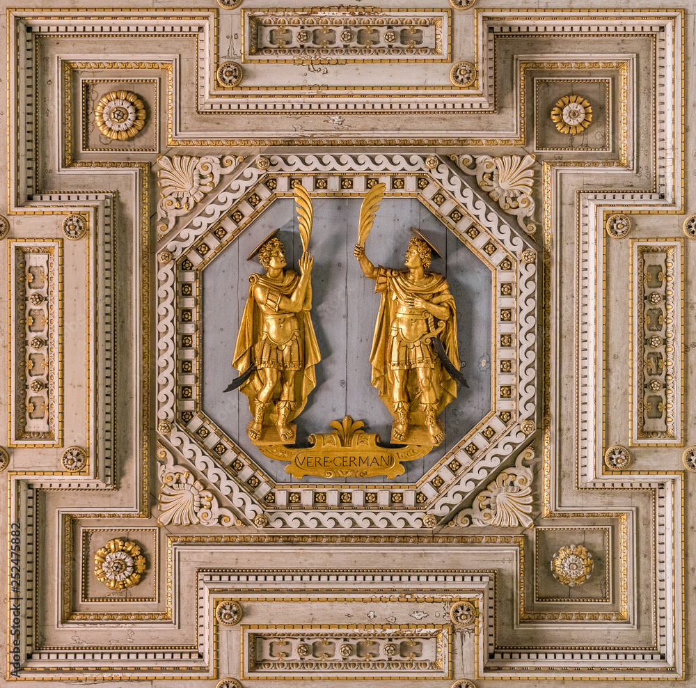 Obraz premium Detail from the ceiling of the Basilica of Saints John and Paul with the saints statues. Caelian Hill in Rome, Italy.