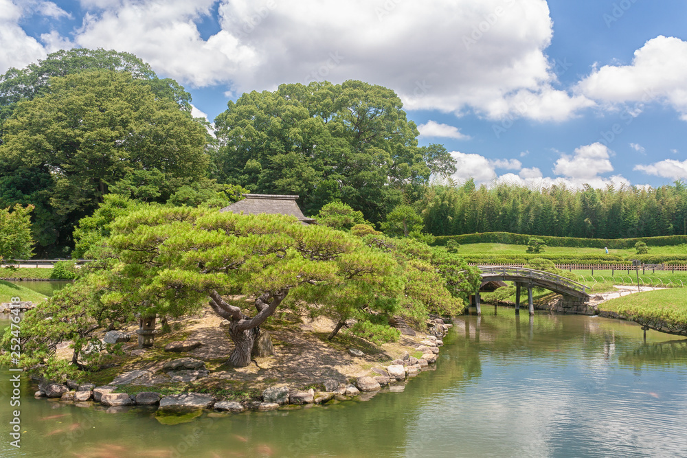 Pond Scene at the Old Korakuen Garden in Okayama, Japan Pond Scene at the Old Korakuen Garden in Okayama, Japan