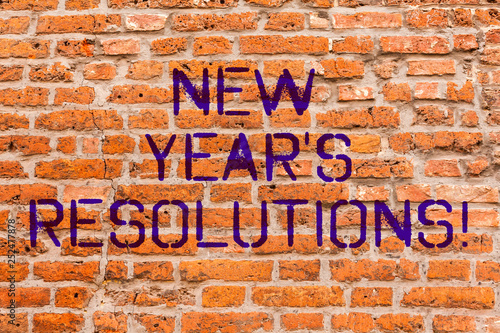 Conceptual hand writing showing New Year S Resolutions. Business photo showcasing Goals Objectives Targets Decisions for next 365 days Brick Wall art like Graffiti motivational written on wall