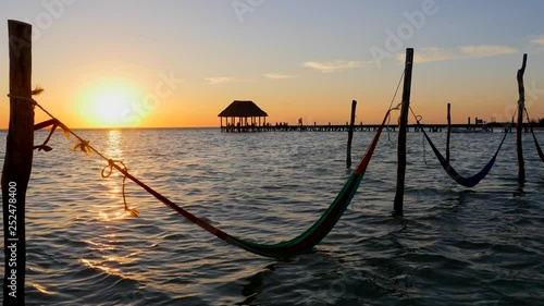 Mayan Riviera palm trees beach sunset at Holbox island in Caribbean sea of Mexico photo