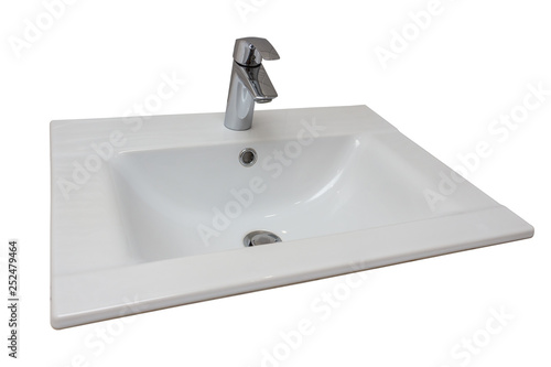 Ceramic white washbasin with stainless faucet, isolated. Bathroom interior element