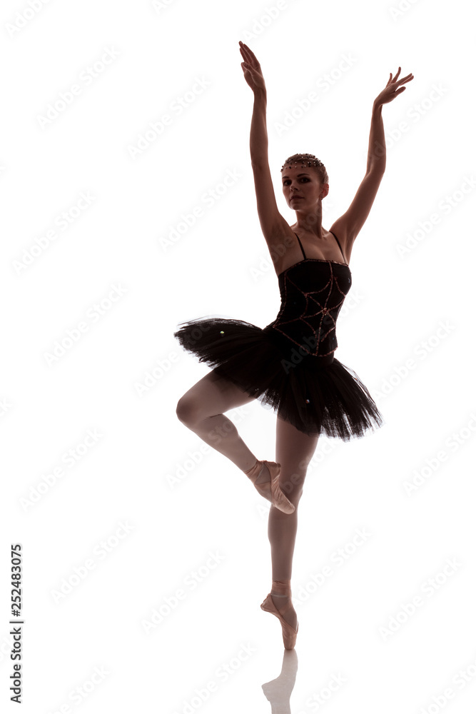 woman ballerina in black pack posing on white background photo made in the  style of "low key" Stock Photo | Adobe Stock