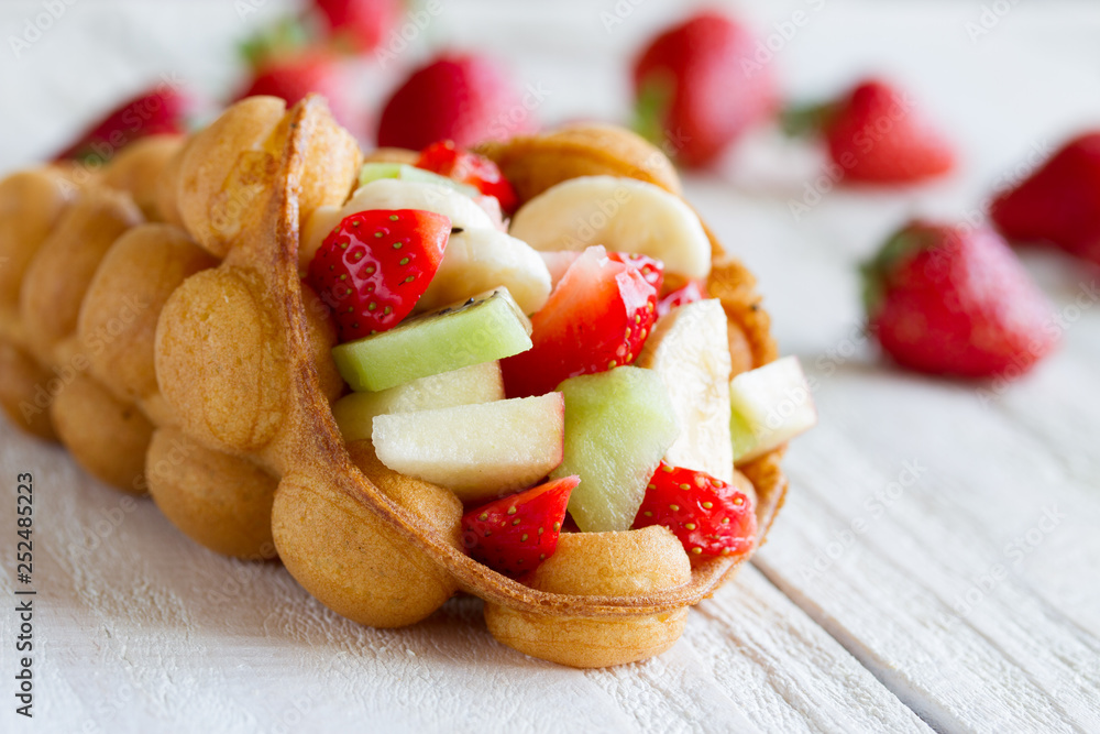 waffles with fruits, strawberries, apple and kiwi waffles with fruits, strawberries, apple and kiwi