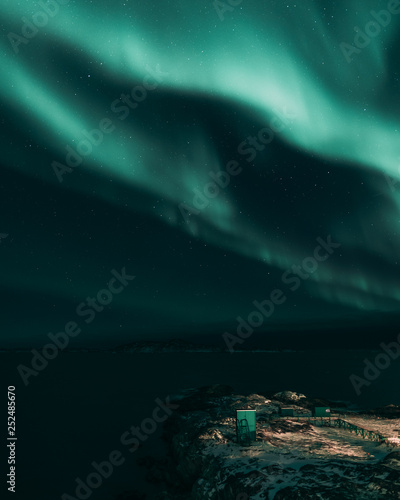 Northen light over Greenland landscape © Ulannaq