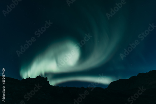 Northen light over Greenland landscape © Ulannaq