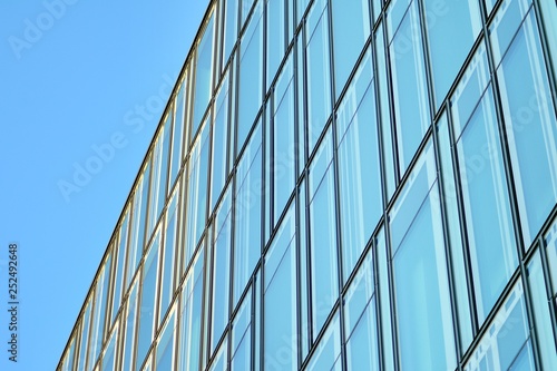 The windows of a modern building for offices. Business buildings architecture.