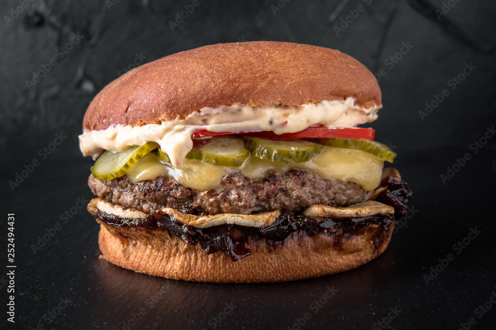 Juicy fresh delicious hamburger. The burger menu.