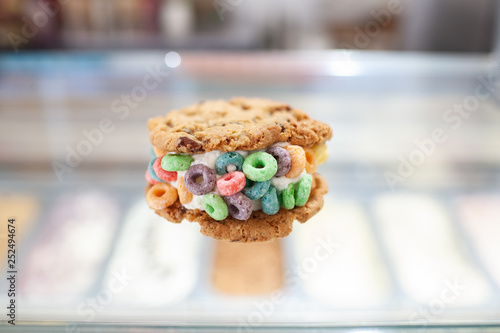 Ice cream sandwich with colorful cereal 