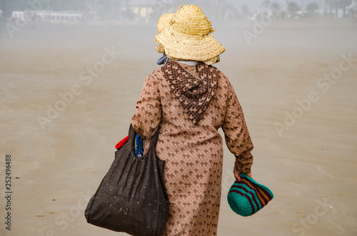 Hawker at Essaouira beach, Marocco photo