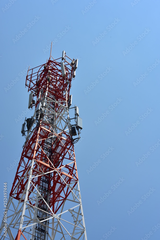 Wireless Communication Antenna With bright sky.Telecommunication tower with antennas with blue sky.– Wireless Communication Antenna With bright sky.Telecommunication tower with antennas with blue sky.–