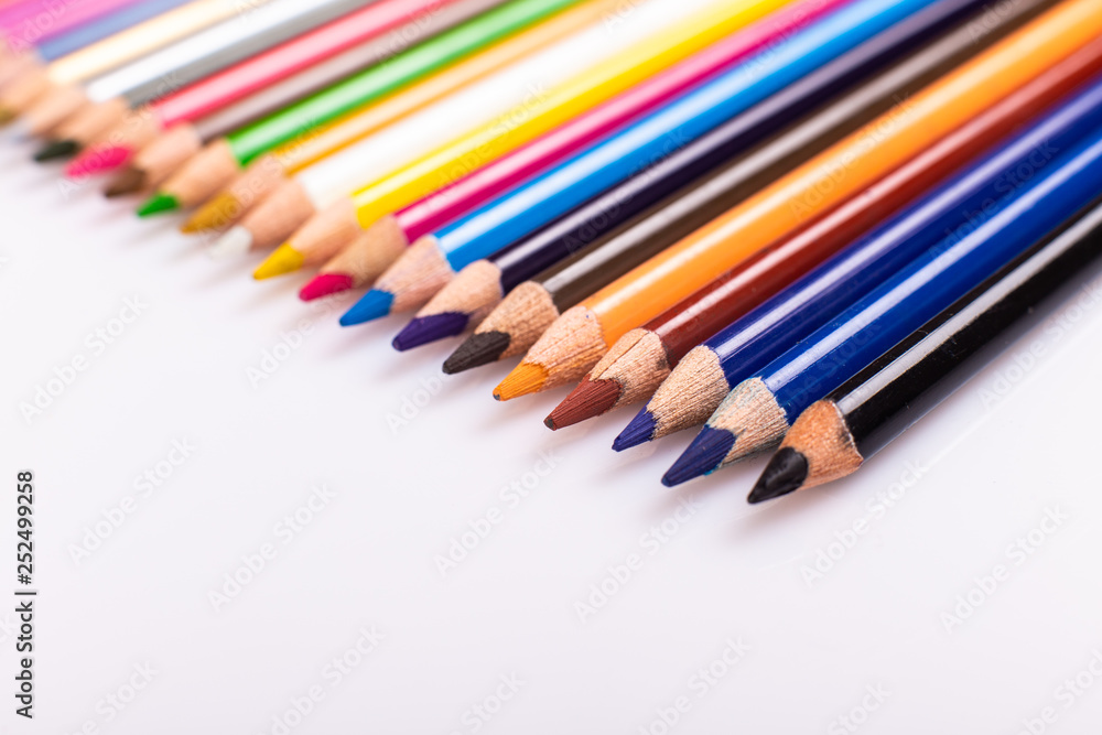 Color pencils isolated on white background. Close up. Color pencils isolated on white background. Close up.