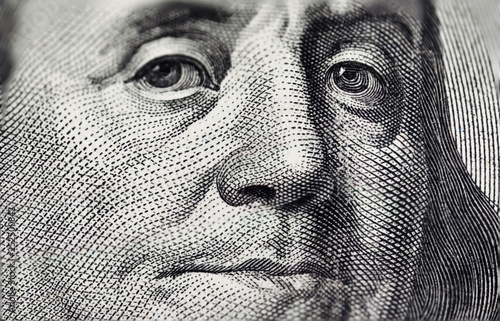 USA President Benjamin Franklin portrait macro photo on US currency dollar