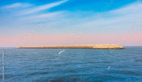 Sea and blue sky, arabian Sea, Around Mandwa jetty,Alibaug, Maharashtra, India photo