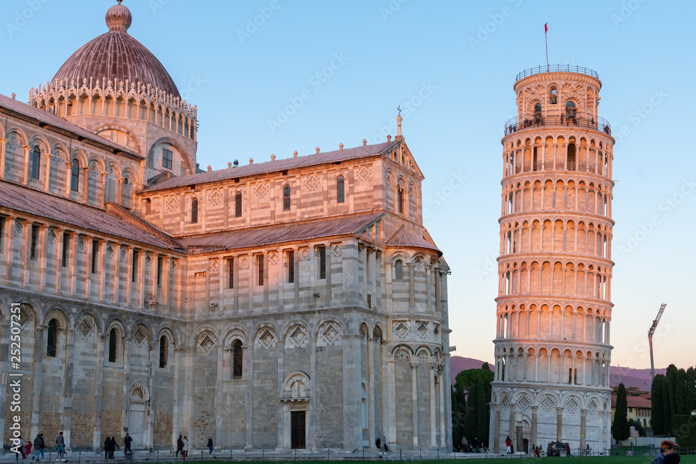Pisa,tuscany/Italy 23 february 2019 :the Cathedral of Pisa and the legendary leaning tower in a bright but cold sunny day