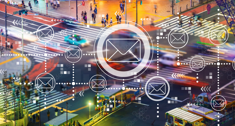 Emails with busy city traffic intersection at night Emails with busy city traffic intersection at night