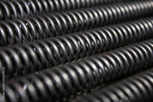 .several stretched tension iron springs