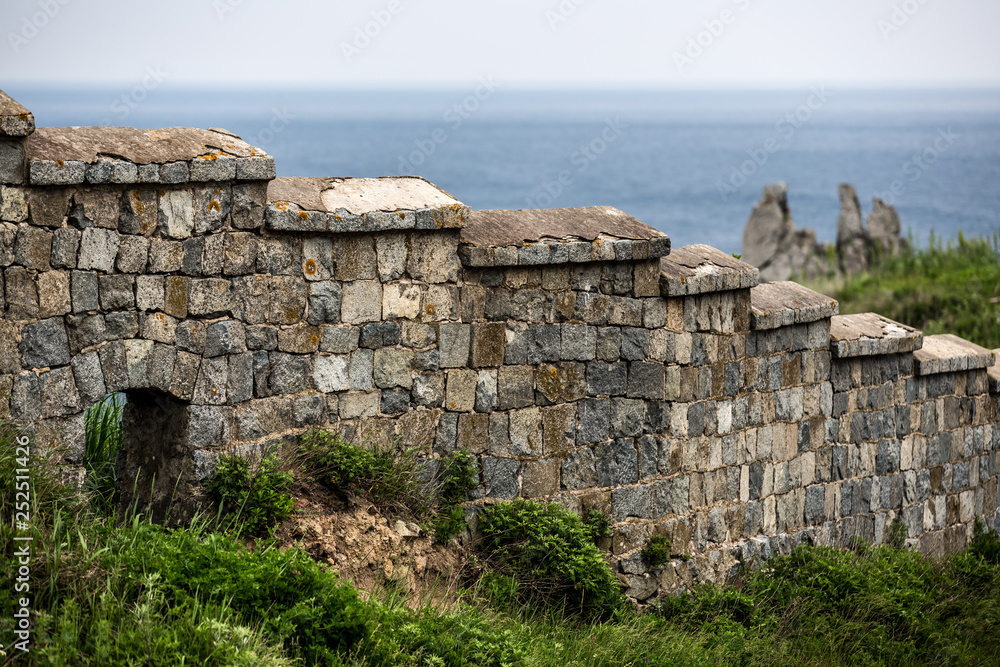 stone wall against the sea