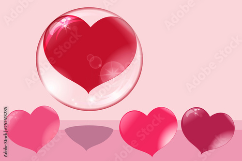 a loving heart flies up in a bubble, other hearts remain on the ground, a soap bubble photo