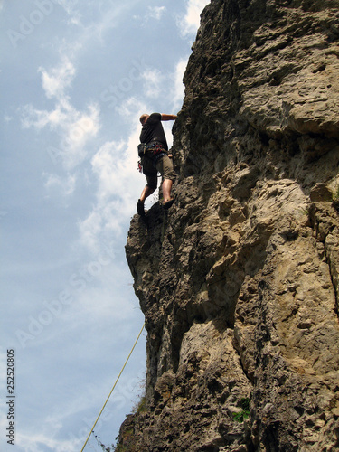 man doing sport climbing