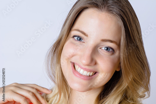 Portrait of young woman in a studio.