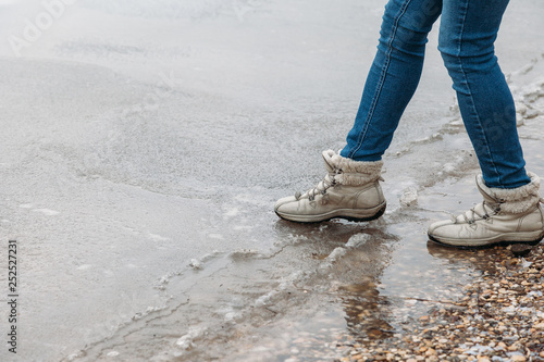 Принти на полотні foot comes on thin ice, danger in the spring,