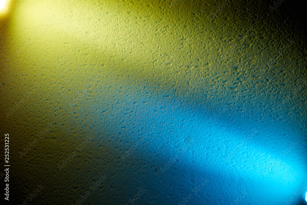 Yellow and blue light of lanterns divide the background into two parts Yellow and blue light of lanterns divide the background into two parts