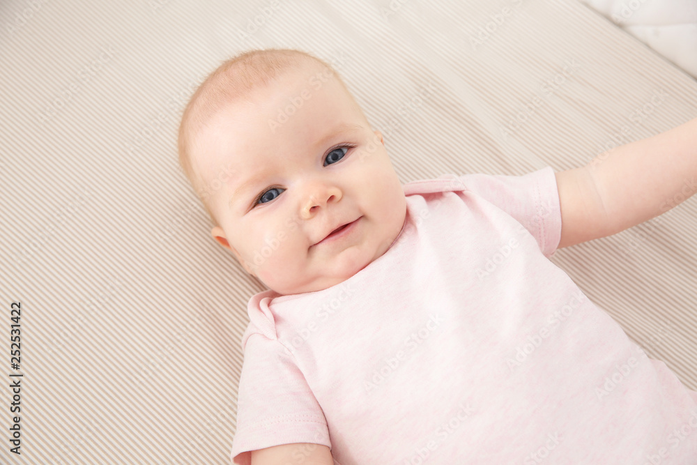 Cute baby girl in crib. Bedtime schedule Cute baby girl in crib. Bedtime schedule